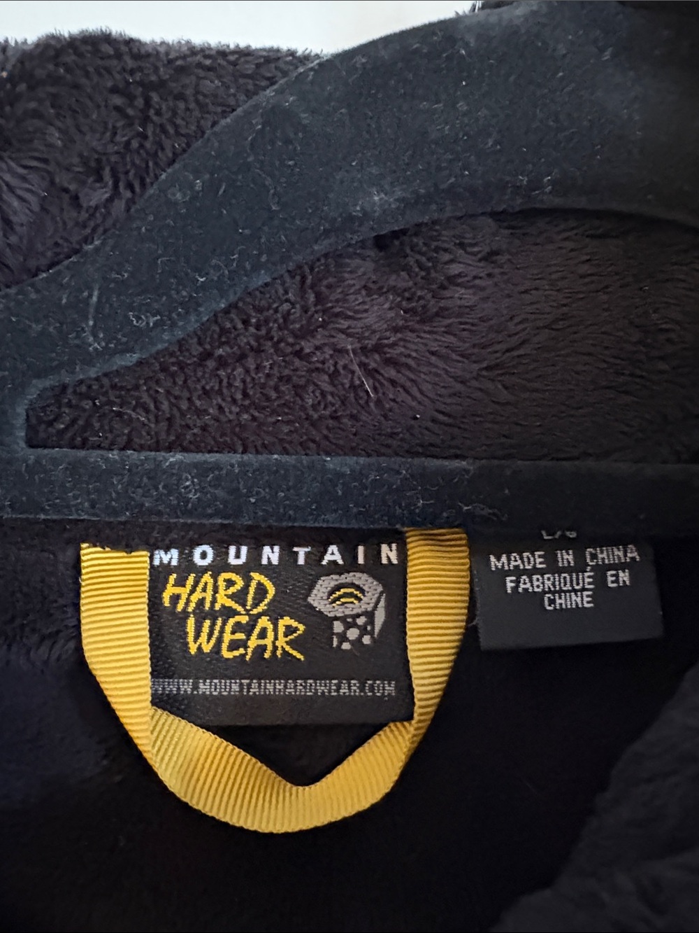 Mountain Hardwear Black Fleece Jacket with Yellow Tag Detail